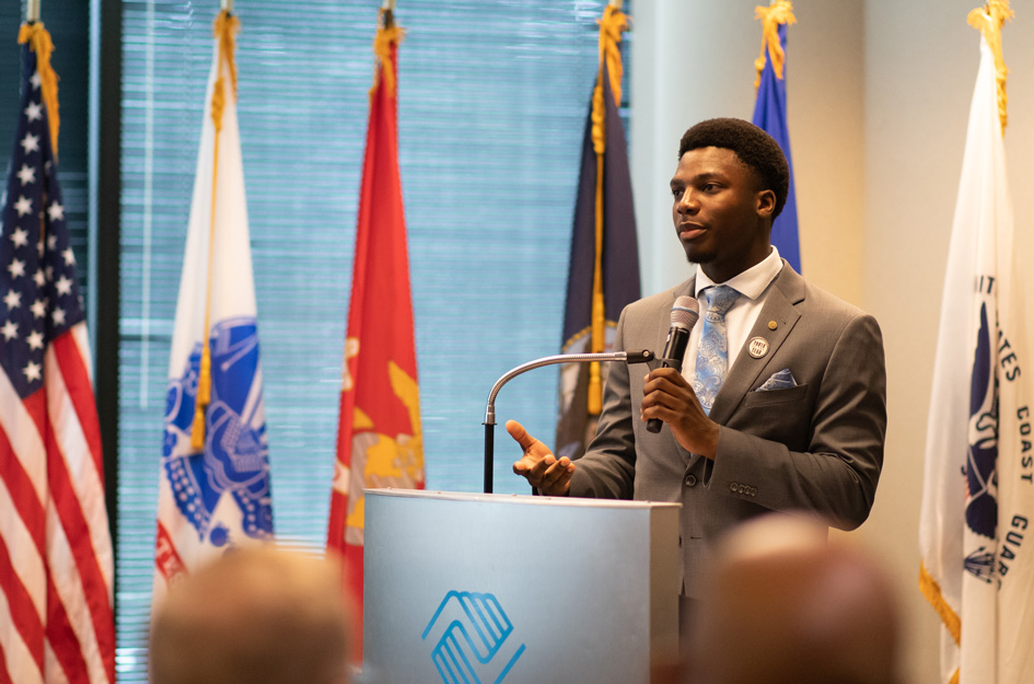 Christian at podium