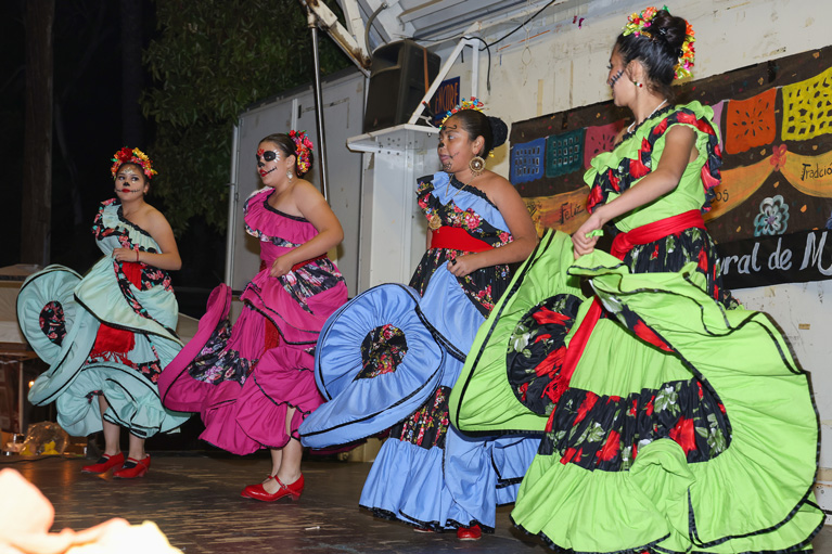 4 girls dancing on stage - Day of the Dead