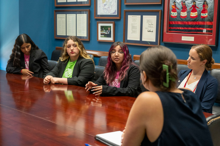 Club teens at SAY speaking with representatives