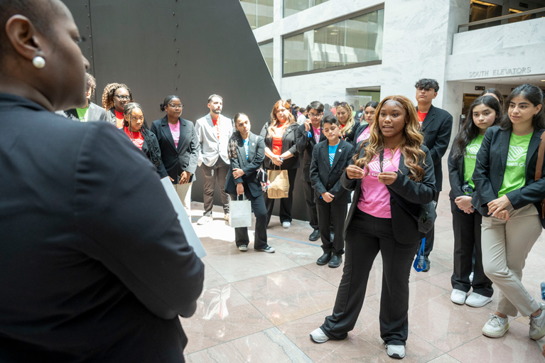 Club teens at SAY speaking with representatives