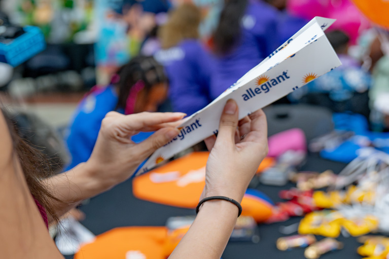 Paper plane at Allegiant event