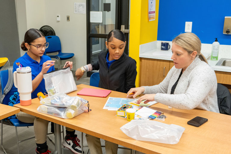 The Cigna Group volunteer and Club kids