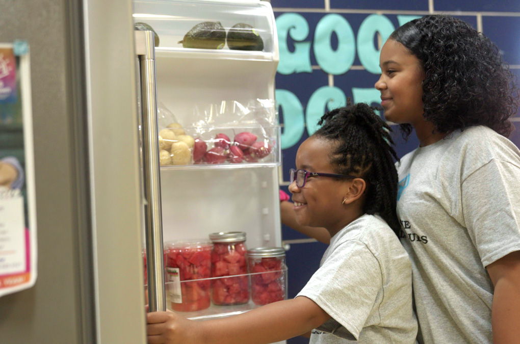 Maytag Fridge opening with two Club kids