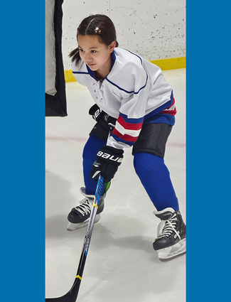 Liana playing Hockey